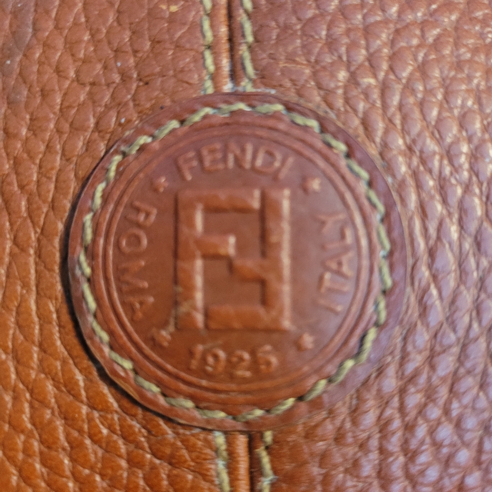 A vintage Fendi leather duffle bag.